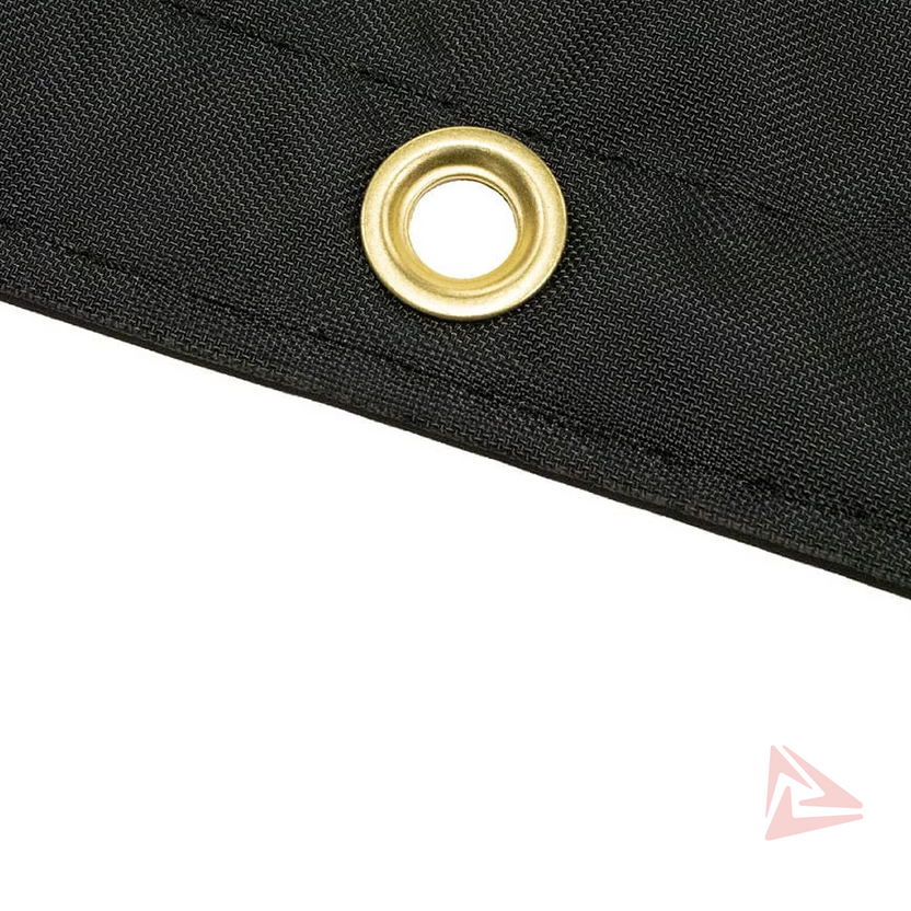 Close-up of a gold eyelet on black fabric