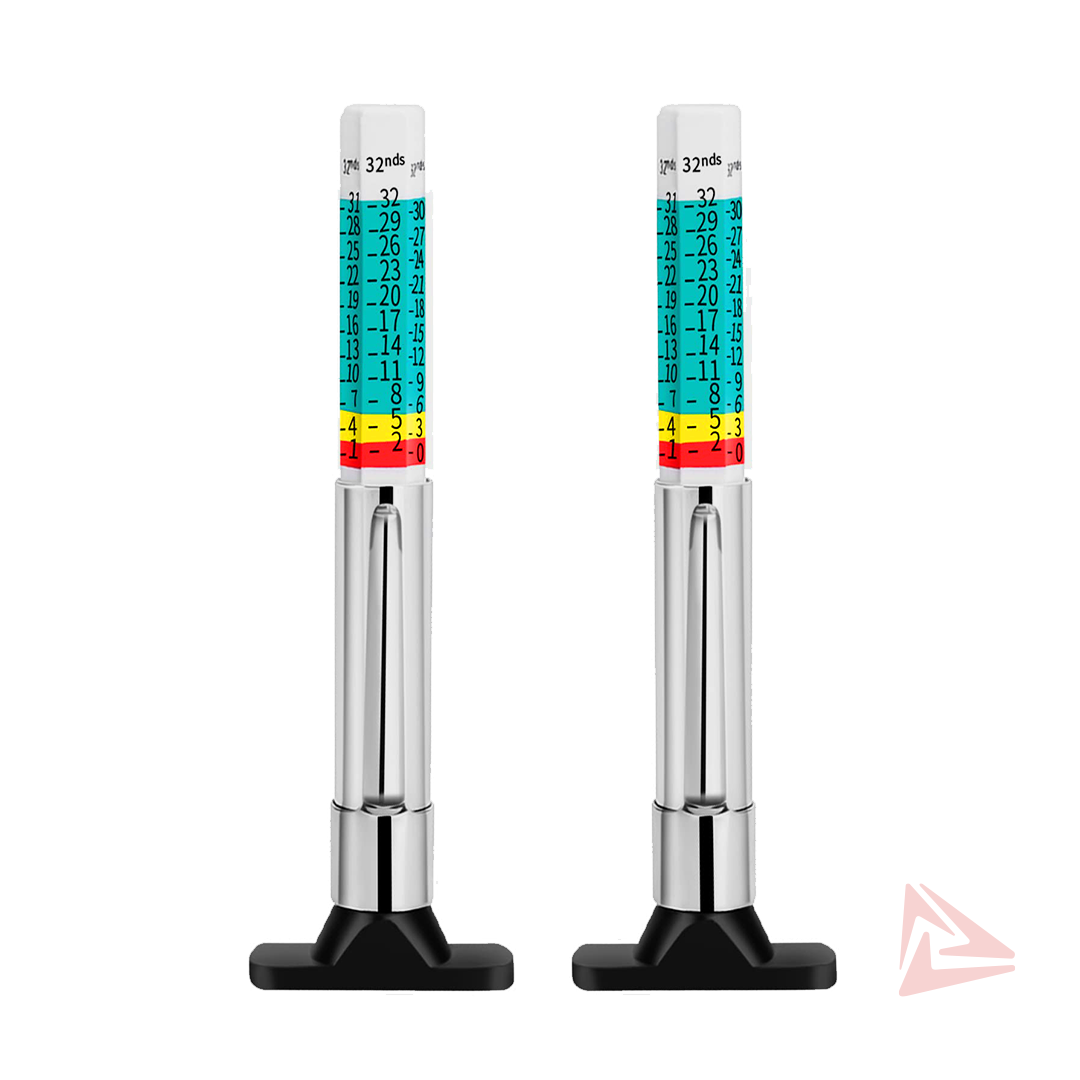 Two electronic pressure gauges with colorful measurement scales on a white background